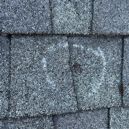 results of hail storm damage on a roof