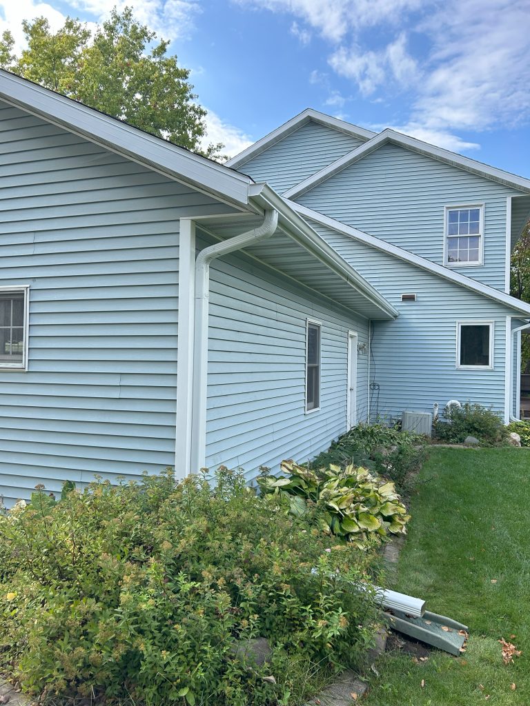 Close up of the updated siding on a house, showing an example of how to beautify your home exterior
